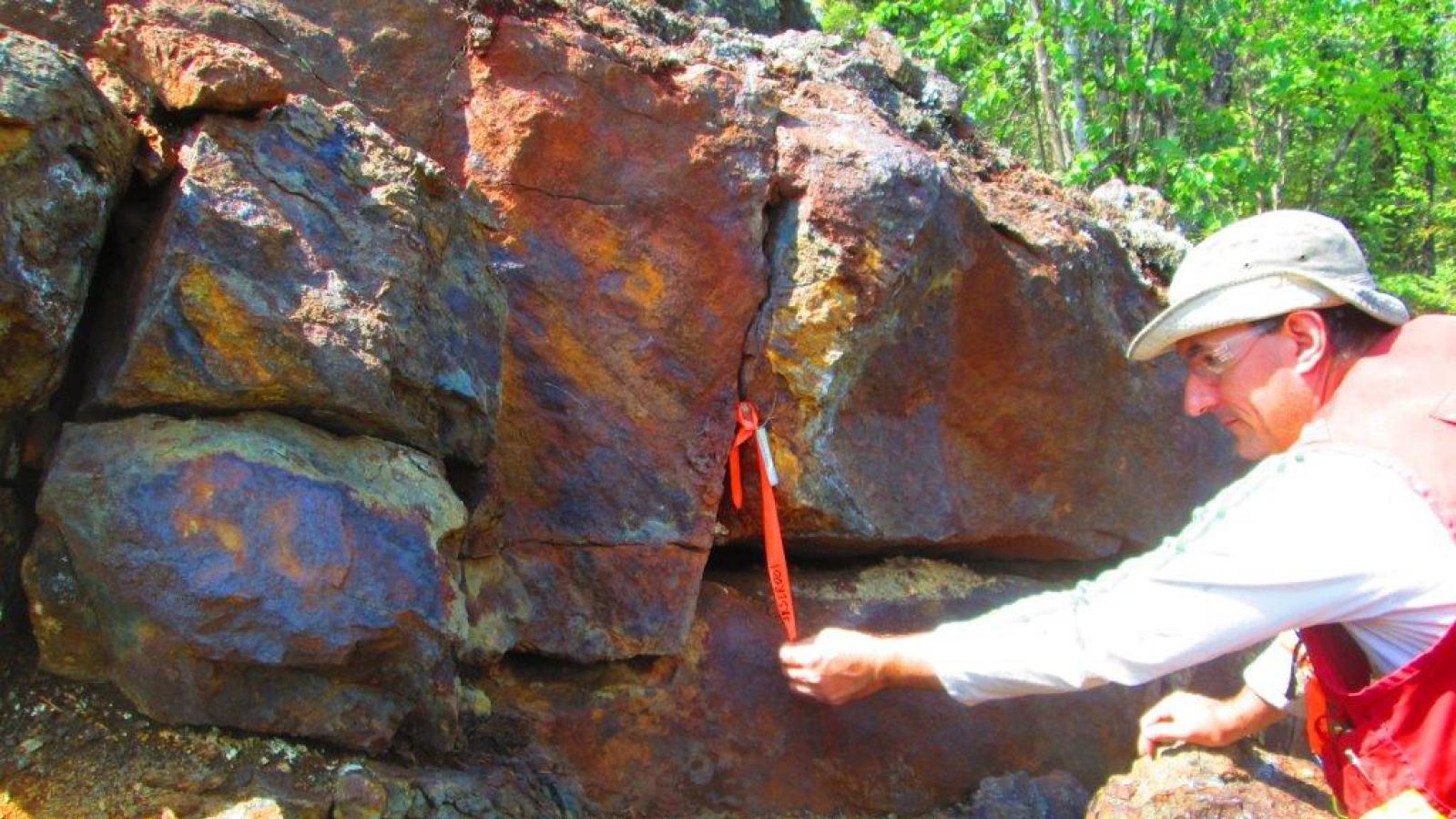 Eagle Plains personell sampling outcrop for Uranium mineralization